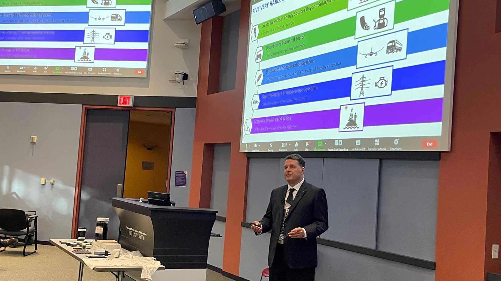 Matteo Pasquali standing in lecture hall giving presentation.