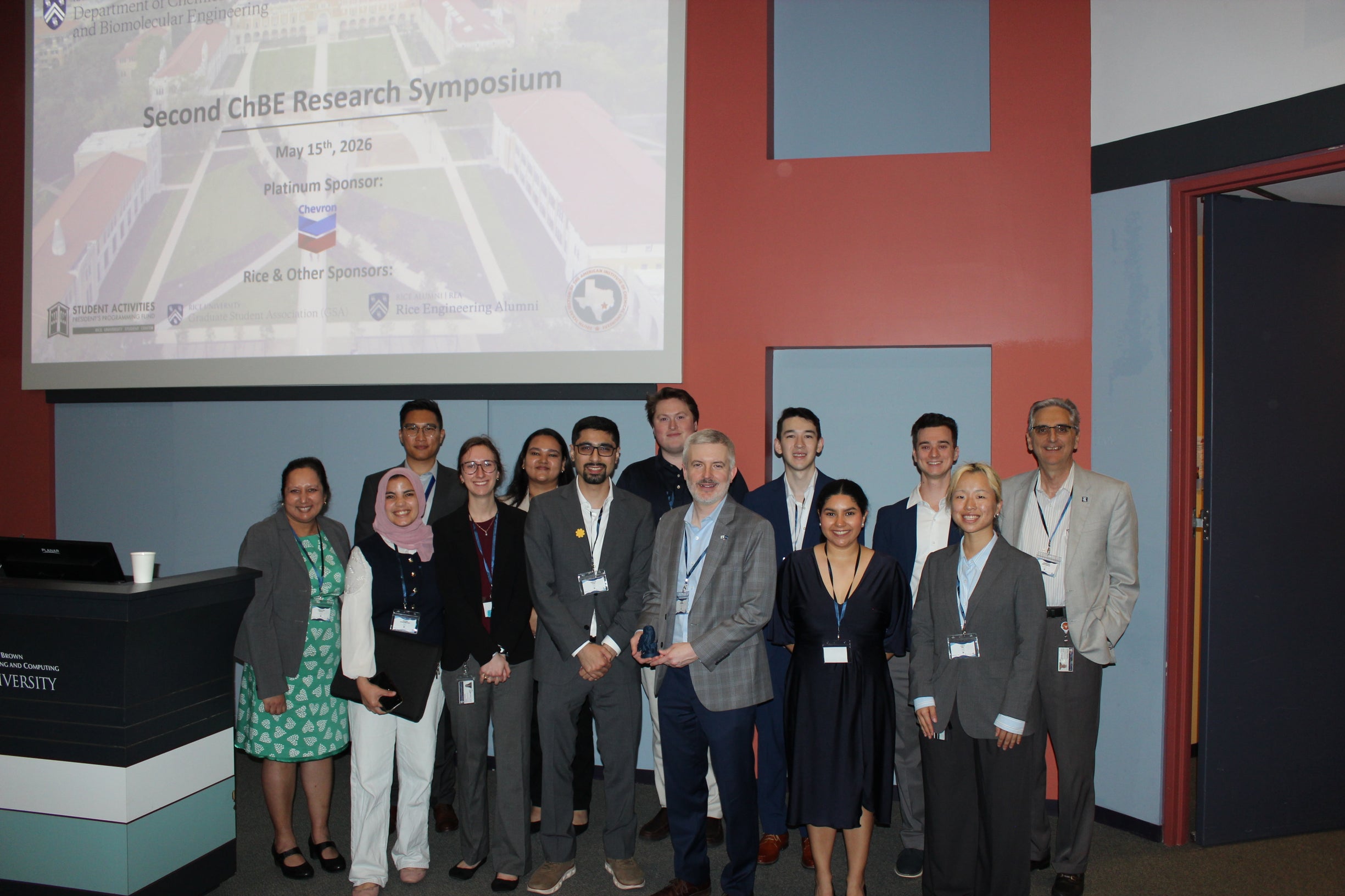 Students and faculty pose for photo at Chevron Lecture